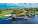 Picturesque aerial view of community dock, gazebo, and walking paths by the lake at 2811 Barret Ave, Plant City, FL 33566