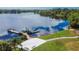 Aerial view of community dock, gazebo and paved walking path by the serene lake at 2811 Barret Ave, Plant City, FL 33566