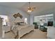 Bright primary bedroom features vaulted ceiling, sitting area, and pool view at 2811 Barret Ave, Plant City, FL 33566