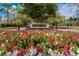 Inviting community entrance with colorful flower beds and a stone sign at 2811 Barret Ave, Plant City, FL 33566