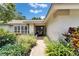 Inviting front entrance with beautifully landscaped walkway and double doors at 2811 Barret Ave, Plant City, FL 33566