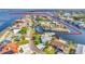 Aerial view of waterfront home with Gulf access, surrounded by canals at 3181 Gulf Winds Cir, Hernando Beach, FL 34607