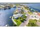 Scenic aerial view of waterfront property, canal, and access to the Gulf at 3181 Gulf Winds Cir, Hernando Beach, FL 34607
