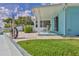 Waterfront home featuring a patio and a chair to relax and enjoy the views at 3181 Gulf Winds Cir, Hernando Beach, FL 34607