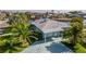 View of the home's side, driveway and covered parking area at 3181 Gulf Winds Cir, Hernando Beach, FL 34607