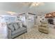 Inviting living space with a fireplace, open to the dining area and kitchen at 3181 Gulf Winds Cir, Hernando Beach, FL 34607