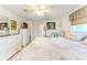 Spacious main bedroom with ensuite access, neutral décor, and ample natural light at 3181 Gulf Winds Cir, Hernando Beach, FL 34607