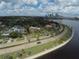 Beautiful waterfront homes and city skyline views from above on a sunny day at 3317 Nakora Dr, Tampa, FL 33618