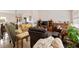 Inviting living room featuring comfortable seating, entertainment center, and a piano at 3317 Nakora Dr, Tampa, FL 33618