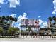 Raymond James Stadium featuring the 'Go Bucs' sign with palm trees and a sunny sky at 3317 Nakora Dr, Tampa, FL 33618