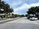 Tree lined street showcasing shops and storefronts with parked cars at 3317 Nakora Dr, Tampa, FL 33618