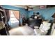 Bedroom featuring carpet, a ceiling fan, and a window with natural light at 3907 Orchard Hill Cir, Palm Harbor, FL 34684