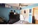 Bedroom featuring carpet, a ceiling fan, and a window with natural light at 3907 Orchard Hill Cir, Palm Harbor, FL 34684