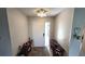 Foyer featuring decorative accents and a glass insert in the front door at 3907 Orchard Hill Cir, Palm Harbor, FL 34684