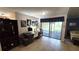 Comfortable office space with desk, natural light, and convenient access to the living area at 3907 Orchard Hill Cir, Palm Harbor, FL 34684