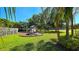 Community playground featuring play structures and green spaces, offering a fun and safe environment for children at 3907 Orchard Hill Cir, Palm Harbor, FL 34684