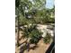 Lush courtyard with picnic tables, providing a serene and inviting outdoor space for relaxation at 4051 58Th N St # 241C, Kenneth City, FL 33709