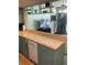 Kitchen with breakfast bar overlooks entryway and sitting area at 4051 58Th N St # 241C, Kenneth City, FL 33709