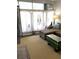 Cozy living room featuring sheer curtains and a comfortable sectional couch at 4051 58Th N St # 241C, Kenneth City, FL 33709