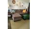 Cozy living room featuring a sectional sofa, lamps, and decorative wall art at 4051 58Th N St # 241C, Kenneth City, FL 33709