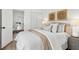 Inviting bedroom featuring a cozy bed, closet, and access to the adjacent dining area at 411 37Th S St, St Petersburg, FL 33711