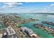 Aerial view of community featuring waterfront property and canal access at 415 Island Way # 303, Clearwater Beach, FL 33767