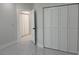 Spacious bedroom with ample closet space and contemporary fixtures, creating a comfortable atmosphere at 4241 E Palifox St, Tampa, FL 33610