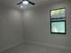 A bright bedroom with a view outside the window at 4241 E Palifox St, Tampa, FL 33610