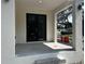 Covered entryway featuring a modern double door entrance and recessed lighting at 4241 E Palifox St, Tampa, FL 33610