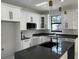 This kitchen showcases sleek countertops, custom cabinets, and stainless appliances at 4241 E Palifox St, Tampa, FL 33610