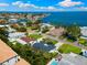 Aerial shot of neighborhood with waterfront access; featuring lush tropical landscape at 4618 Bayshore Ne Blvd, St Petersburg, FL 33703