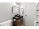 Contemporary bathroom with stylish vanity, lighting, and fixtures at 4618 Bayshore Ne Blvd, St Petersburg, FL 33703