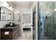 Modern bathroom featuring a glass walk-in shower and dark fixtures at 4618 Bayshore Ne Blvd, St Petersburg, FL 33703