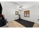 Bright bedroom with hardwood floors and workout equipment at 4618 Bayshore Ne Blvd, St Petersburg, FL 33703