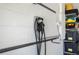 Garage with EV charging station and shelving for convenient storage solutions at 4618 Bayshore Ne Blvd, St Petersburg, FL 33703