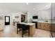 Stylish kitchen with an island, stainless steel appliances, and modern cabinets at 4618 Bayshore Ne Blvd, St Petersburg, FL 33703