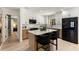Updated kitchen featuring white cabinets, stainless appliances, and an eat-in island at 4618 Bayshore Ne Blvd, St Petersburg, FL 33703
