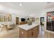 An open floorplan seamlessly connects kitchen, dining, and living areas creating an inviting living space at 4618 Bayshore Ne Blvd, St Petersburg, FL 33703