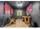 Well-lit office with unique art and shuttered window at 4618 Bayshore Ne Blvd, St Petersburg, FL 33703
