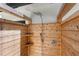 Close-up of the outdoor shower featuring a shower head, handheld shower, and convenient shelves at 4618 Bayshore Ne Blvd, St Petersburg, FL 33703