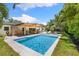 Backyard pool with a covered patio and outdoor lounge area at 4618 Bayshore Ne Blvd, St Petersburg, FL 33703