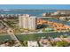 Waterfront community featuring a high-rise condominium building, canal access and community pool at 4900 Brittany S Dr # 209, St Petersburg, FL 33715