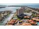 Beautiful aerial view of the waterfront condo, community pool, boat docks, and canal at 4900 Brittany S Dr # 209, St Petersburg, FL 33715