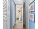 Bathroom featuring a toilet, seashell decor, and closet space at 4900 Brittany S Dr # 209, St Petersburg, FL 33715