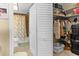 Bathroom featuring a shower-tub, walk-in closet and storage space at 4900 Brittany S Dr # 209, St Petersburg, FL 33715