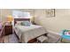 Cozy bedroom with a comfortable bed, side tables, and a serene ambiance for relaxation at 4900 Brittany S Dr # 209, St Petersburg, FL 33715