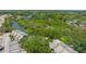 Aerial view of the complex showcasing its lush green landscape and tranquil waterway views at 5435 Sweetwater Terrace Cir, Tampa, FL 33634