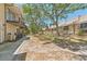 Charming exterior of multi-Gathering building with balconies and mature shade trees at 5435 Sweetwater Terrace Cir, Tampa, FL 33634