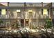Charming townhome featuring a cozy facade, garden, and a well-lit entrance at 5435 Sweetwater Terrace Cir, Tampa, FL 33634