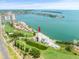 Expansive aerial view of a condo with golf course, highlighting the community's coastal location at 5700 Escondida S Blvd # 401, St Petersburg, FL 33715
